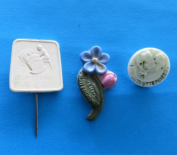 German Badge Trio - Women's Work - morpeth anrtique centre hunter valley german world war two II WHW winterhilfswerk DFW cultural women's work deutdches frauenwerk organisation charity campaign relief tinnie badge third reich