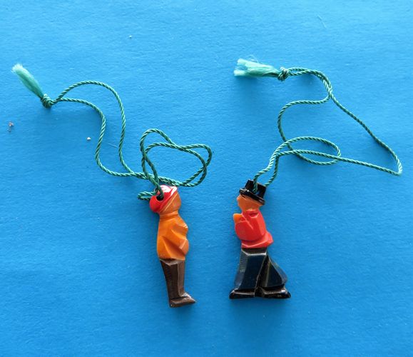 German Token Duo - Town Folk - morpeth anrtique centre hunter valley german world war two II WHW winterhilfswerk folk town people plastic wooden Christmas carolers santa chimney sweep charity campaign relief tinnie badge third reich