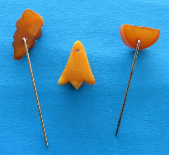 German Donation Trio - Amber - morpeth antique centre hunter valleywildflower german third reich winter charity relief badge amber baltic tinnie donation pin token plastic glass timber pottery metal