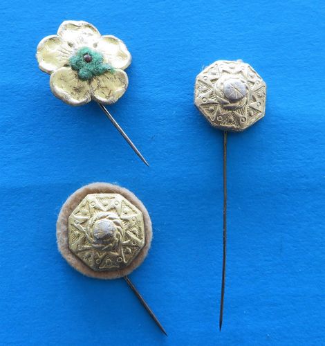 German Pinwheel Trio - morpeth antique centre hunter valleywildflower german third reich winter charity relief badge amber baltic tinnie donation pin token plastic glass timber pottery metal