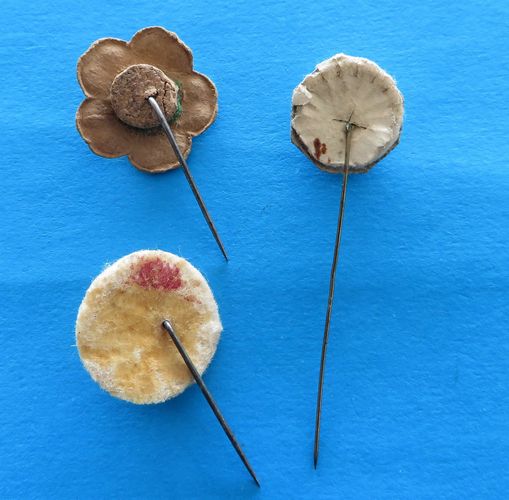 German Pinwheel Trio - morpeth antique centre hunter valleywildflower german third reich winter charity relief badge amber baltic tinnie donation pin token plastic glass timber pottery metal