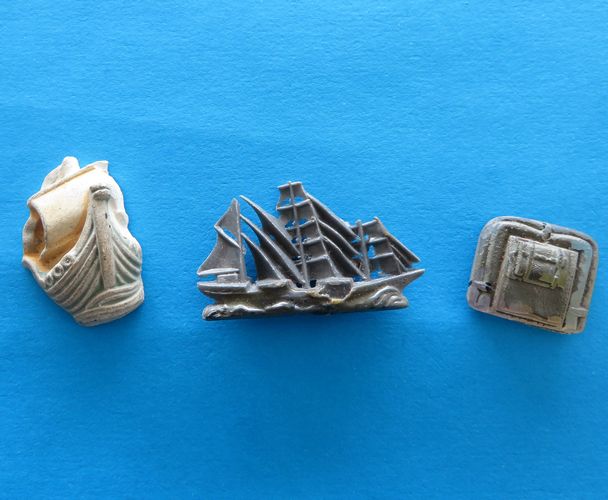 German Donation Trio - Ships - morpeth antique centre hunter valleywildflower german third reich winter charity relief badge amber baltic tinnie donation pin token plastic glass timber pottery metal