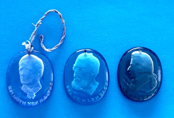 German Charity Token Trio - Personalities - morpeth antique centre hunter valley german world war two II third reich WHW winter charity relief token glass metal plastic donation pin badge personalities writer painter composer philiosopher