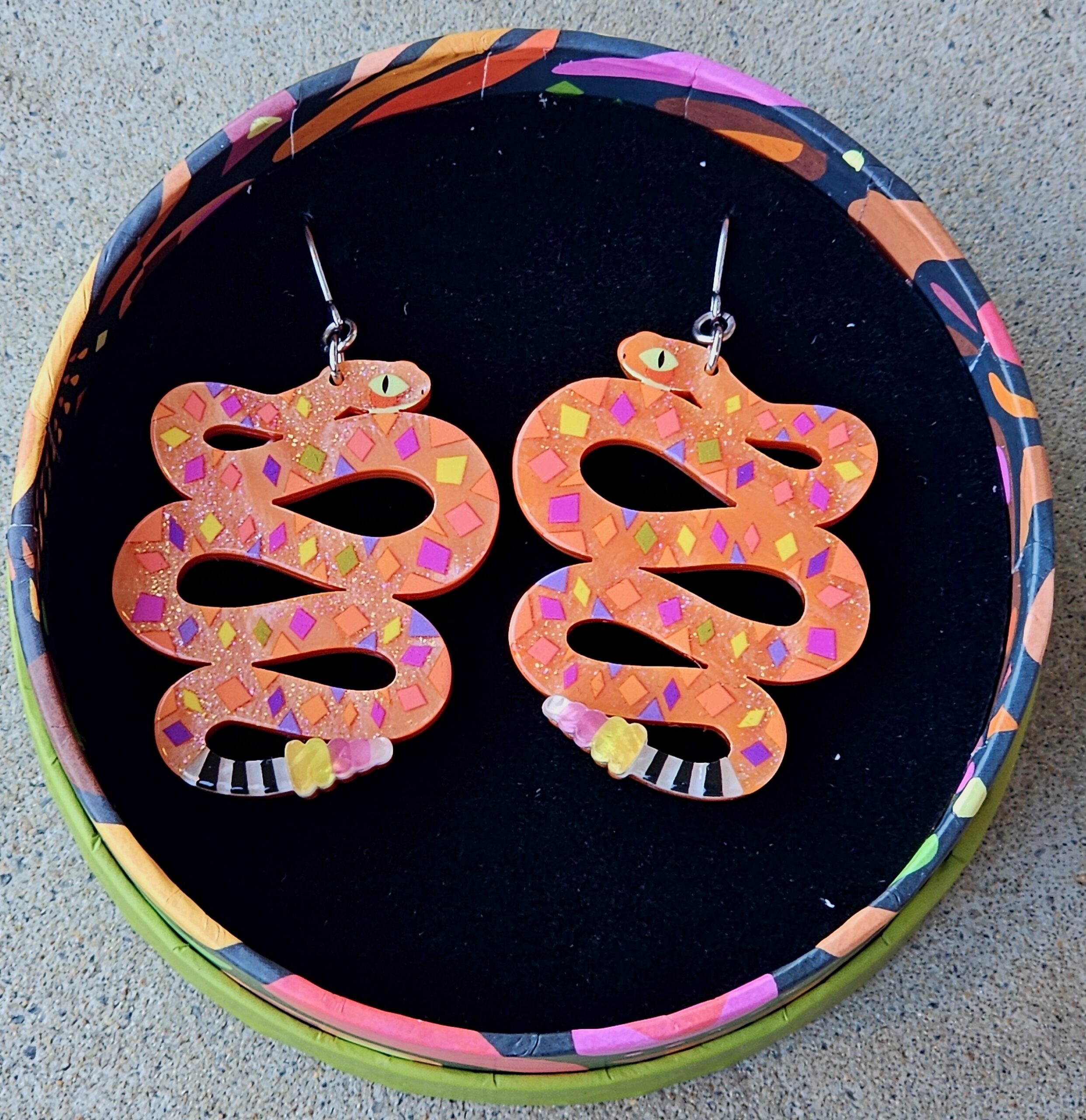 Erstwilder Earrings - The Rowdy Rattlesnake - morpeth antique centre hunter valley erstwilder earrings necklace brooch enamel pin wall art essential pete cromer north america canada woodland wilderness alaska the rowdy rattlesnake