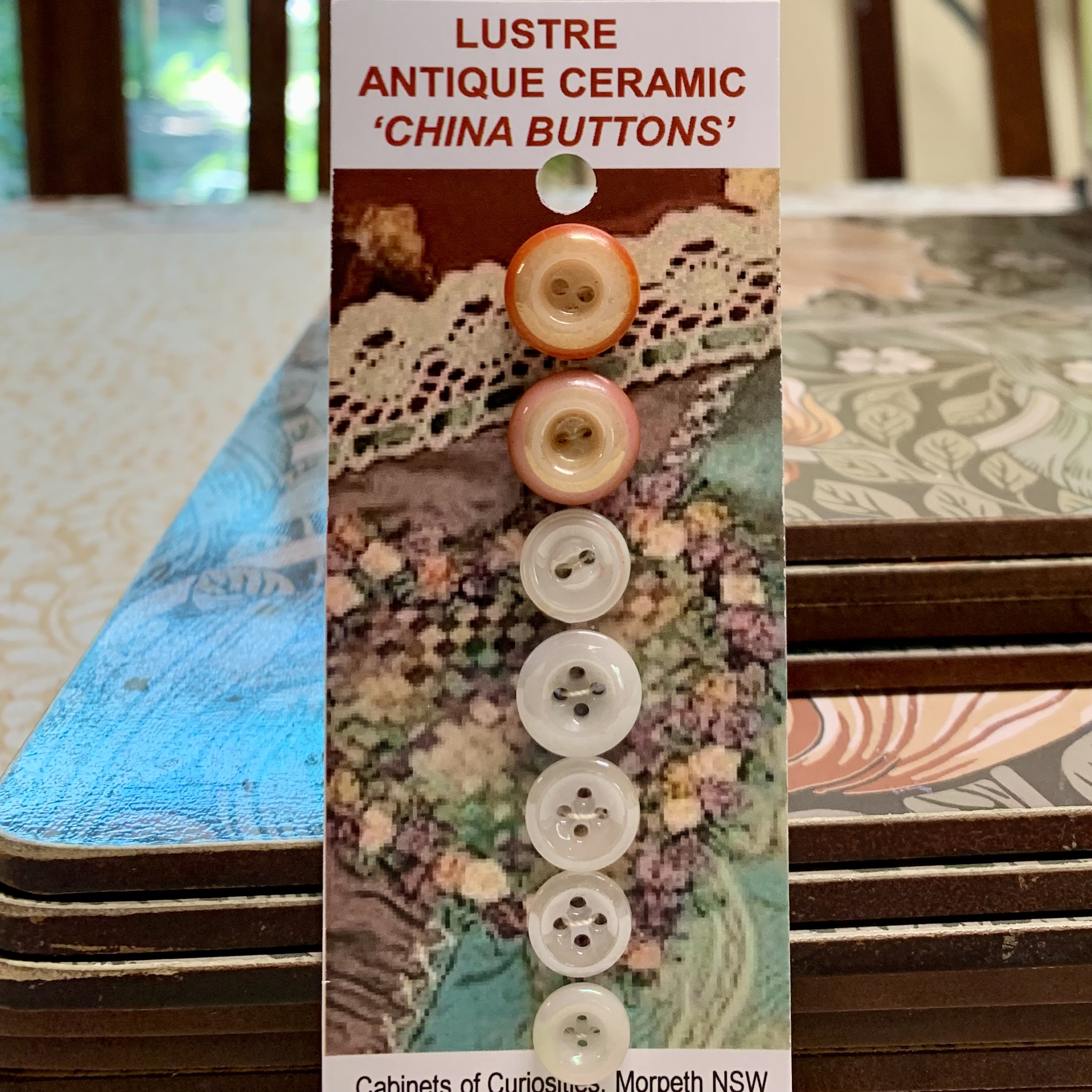 Lustre, 7 china buttons (code 008) - Morpeth Antique Centre NSW Buttons Chinas Lustre