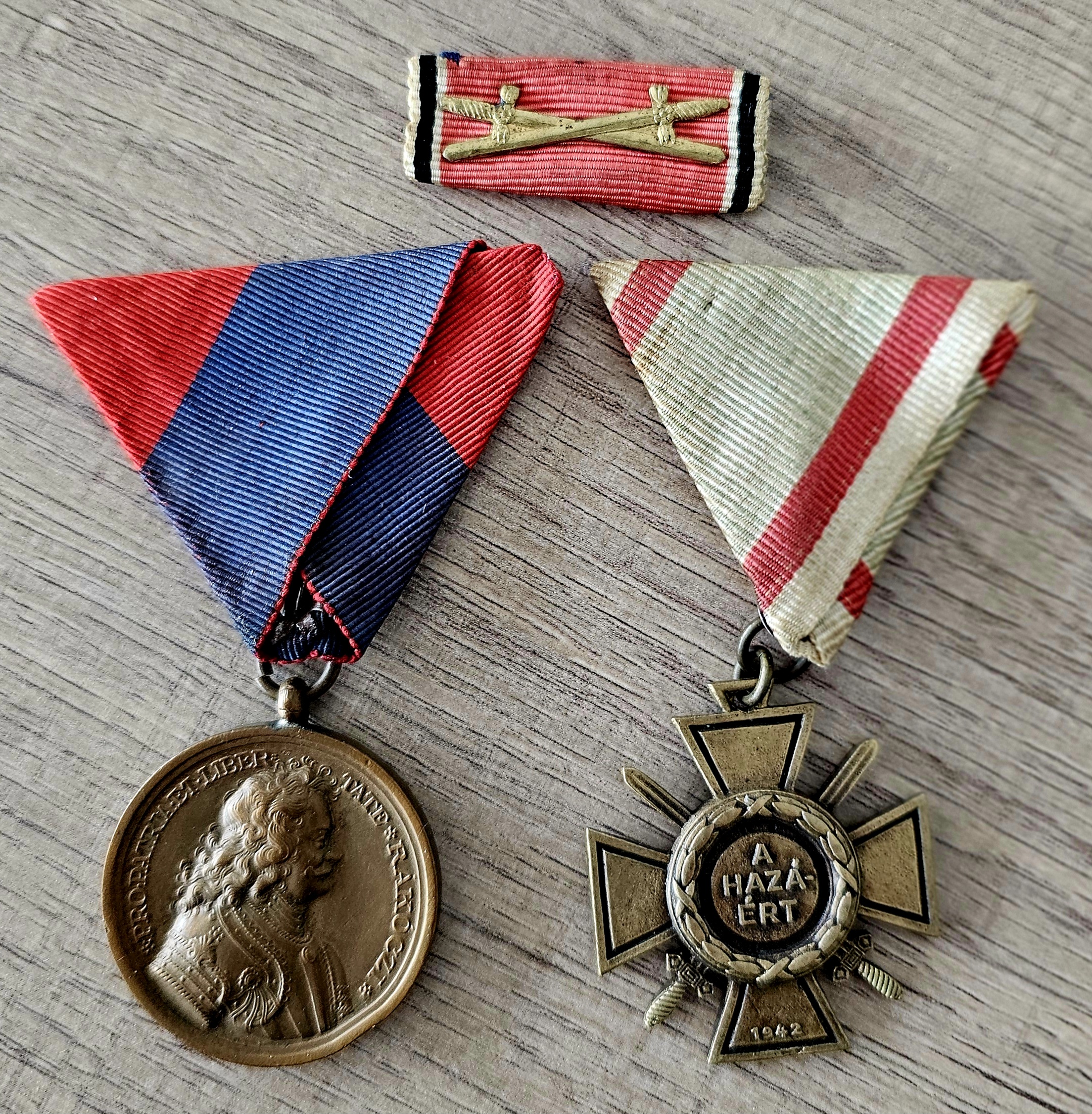 Hungarian & German WWII Era Medal Grouping - morpeth antique centre hunter valley region wwii medal grouping Ladislaus Janik von Emoke German Hungarian Order of Eagle Hubertus medallion combat leadership badge liberation upper hungary fire cross merit military anschluss iron cross second class crossed swords photo album certificate third class