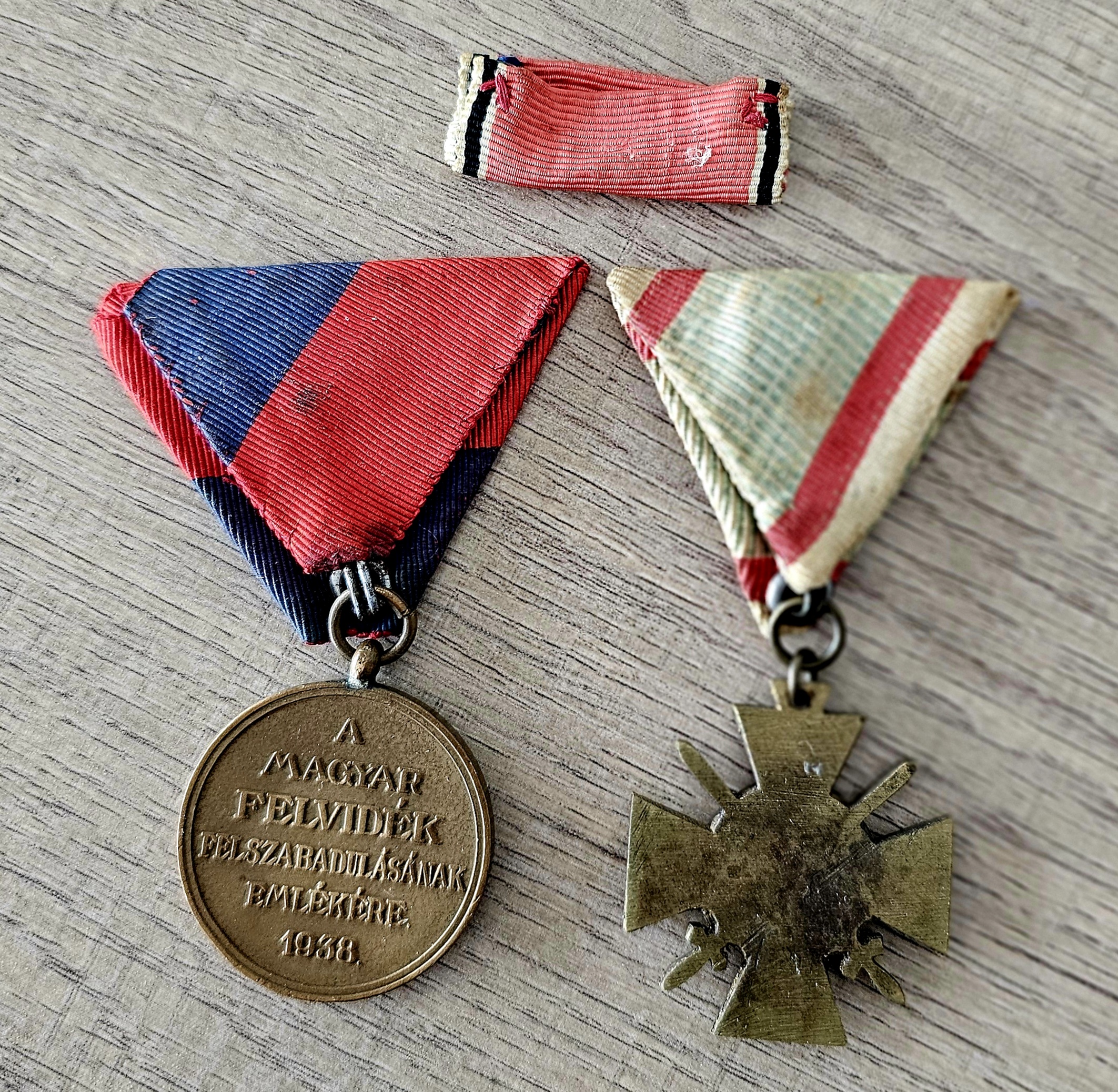 Hungarian & German WWII Era Medal Grouping - morpeth antique centre hunter valley region wwii medal grouping Ladislaus Janik von Emoke German Hungarian Order of Eagle Hubertus medallion combat leadership badge liberation upper hungary fire cross merit military anschluss iron cross second class crossed swords photo album certificate third class